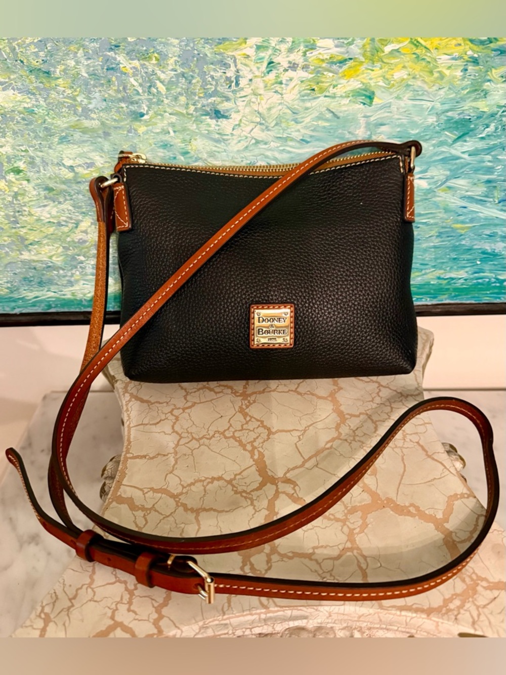 Dooney & Bourke Black Pebbled Leather Crossbody Pouchette with Tan Trim